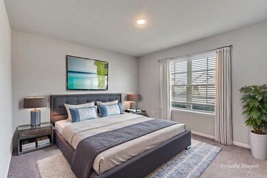 Bedroom with carpet floors and baseboards