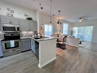 Kitchen featuring a healthy amount of sunlight, st