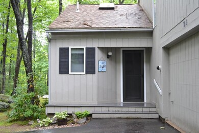 Front entrance with open porch.