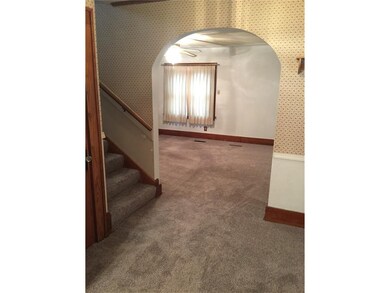 View from foyer to living room, new carpet in 2017