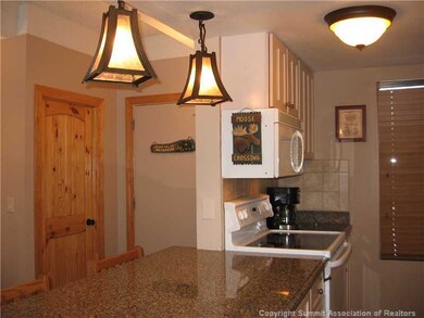 Kitchen. Designer light fixtures located over the