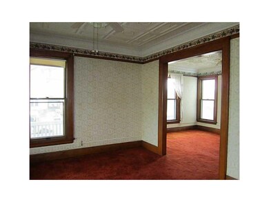 Living Room. Hardwood under carpet