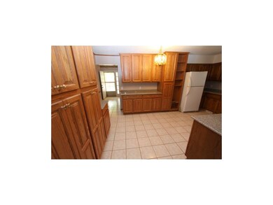 Pantry with smooth rollout drawers makes for a lot