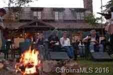Folks gathering at Fire Pit in front of Dining Hal