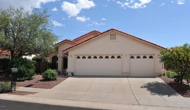 Front of house- 3 car garage