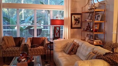 The Great room has a beautiful view of the back, i