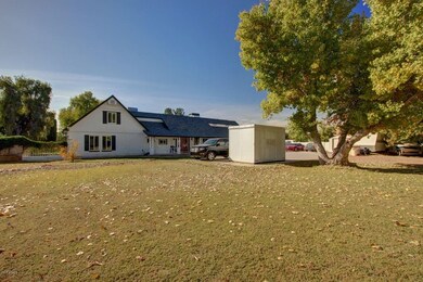 Front left lawn with view of house