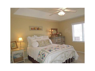 Master Bedroom. Tray ceiling and quiet wooded view