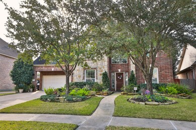 Beautiful brick and stone siding give this home great curb appeal.