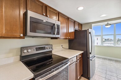 Wood cabinets and stainless appliances