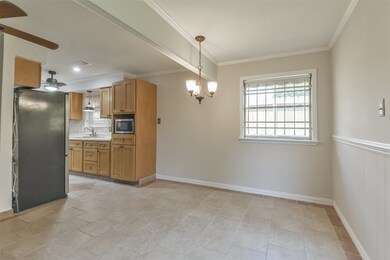 Kitchen adjacent to dining area
