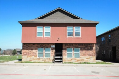 View of front of house featuring a shingled roof,