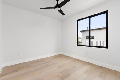Spare room with light wood-style flooring, a ceil