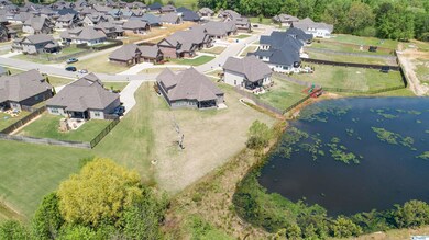 Large lot overlooks water.