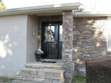 Beautiful entrance with stone front on home.