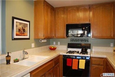 Kitchen includes over the range microwave