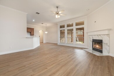Unfurnished living room featuring visible vents, c