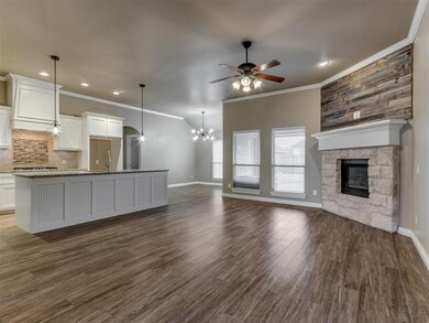Kitchen featuring dark wood-type flooring, tastefu