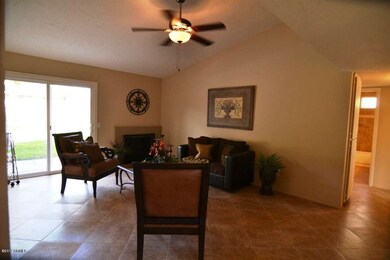 Living Room with fireplace and exit to p