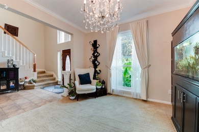 This inviting entryway features a bright, spacious