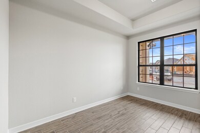 The home office features French doors, beautiful f