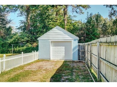 Look at this!  Freshly Painted Detached Garage with new Electrical and Workbenches!  Fenced Rear Yard, great for pets!  And there is a another Detached Shed behind the garage!