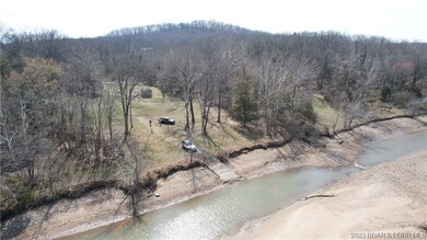 Over 400' of riverfront with electric