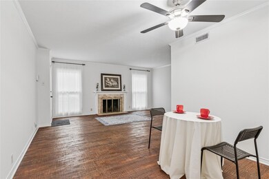 Dining area adjoins living room with beautiful fir