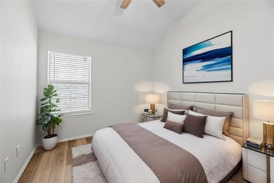 Virtually Staged_Bedroom featuring vaulted ceiling