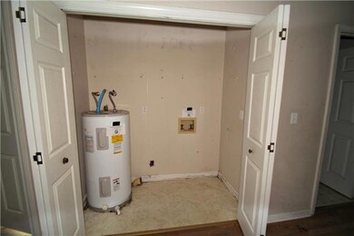 Laundry area just off the kitchen. 