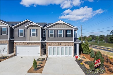 Townhome / multi-family property with board and ba