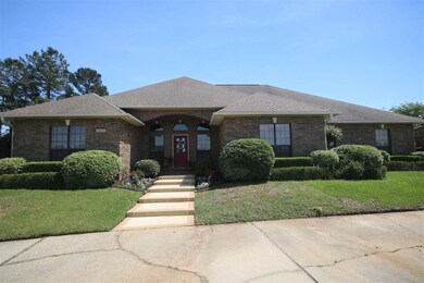Garage w/storage room, attic storage & workshop.