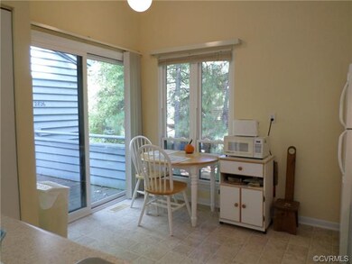 Eat-in kitchen with new sliders to deck