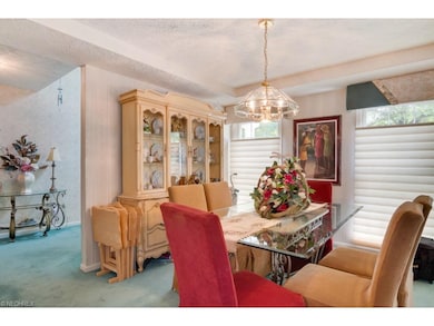 Formal dining room overlooks the quiet street...