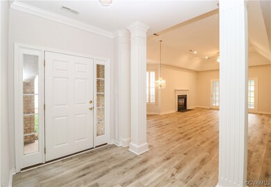 Entry into 3BR, 2BA patio style home with all new flooring and freshly painted.