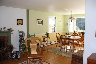 Living room w/ FP to dining room.