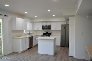 Kitchen with Quartz and SS Appliances