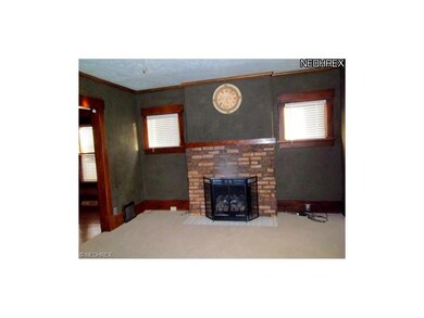 Lower Unit Living Room w/Fireplace and beautiful w