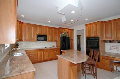 Kitchen - Granite counters, ceramic tile backsplas