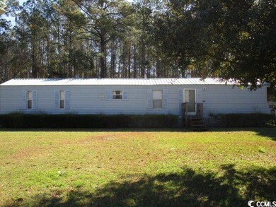 View of front of home with a front yard