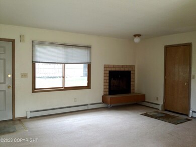 Living room & door to garage