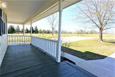 WANTED FOR COVERED FRONT PORCH: ROCKING CHAIRS, A 
