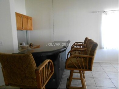 Property Photo. Family Room and Bar