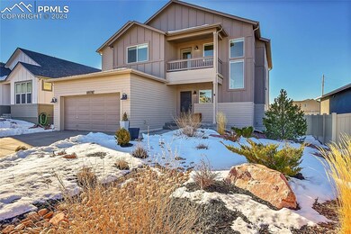 View of front of property featuring a balcony and 
