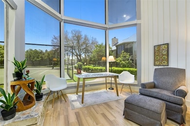 Sunroom / solarium featuring healthy amount of na