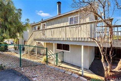Deck wraps around to the front of the home which a