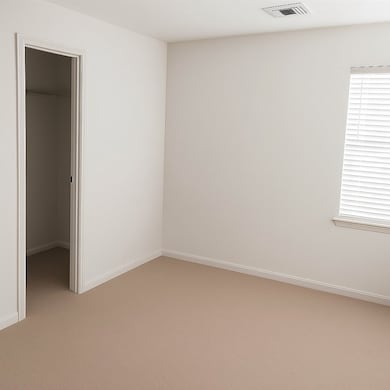 bedroom 1 - floor is laminate wood, not carpet as