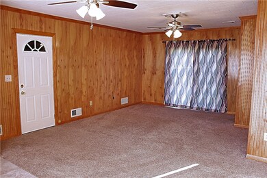 Family Room / Garage Entrace / Slider to Patio