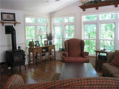 Sunroom. 1st floor sunroom overlooks the back yard