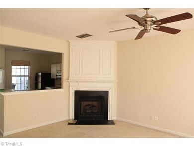 Living Room. Gas log fireplace fully framed to the ceiling.